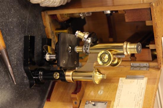 An Ernst Leitz black painted and lacquered brass microscope, cast 13in.